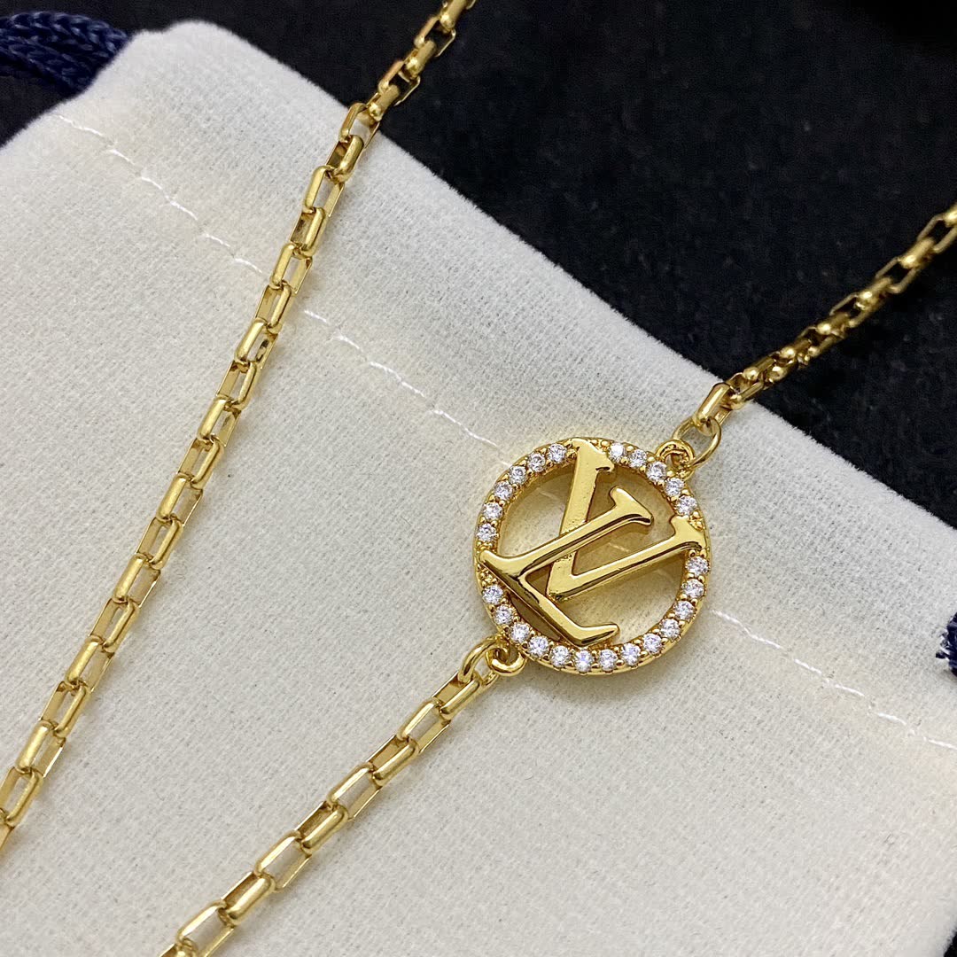 Louis Vuitton Gold-Plated Necklace with Monogram Pendant